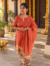 Rust orange festive salwar suit with floral border and matching dupatta